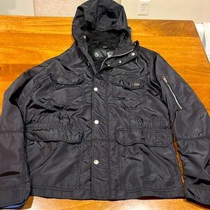 Diesel polyester black zip up and button jacket with hood. Size Large
